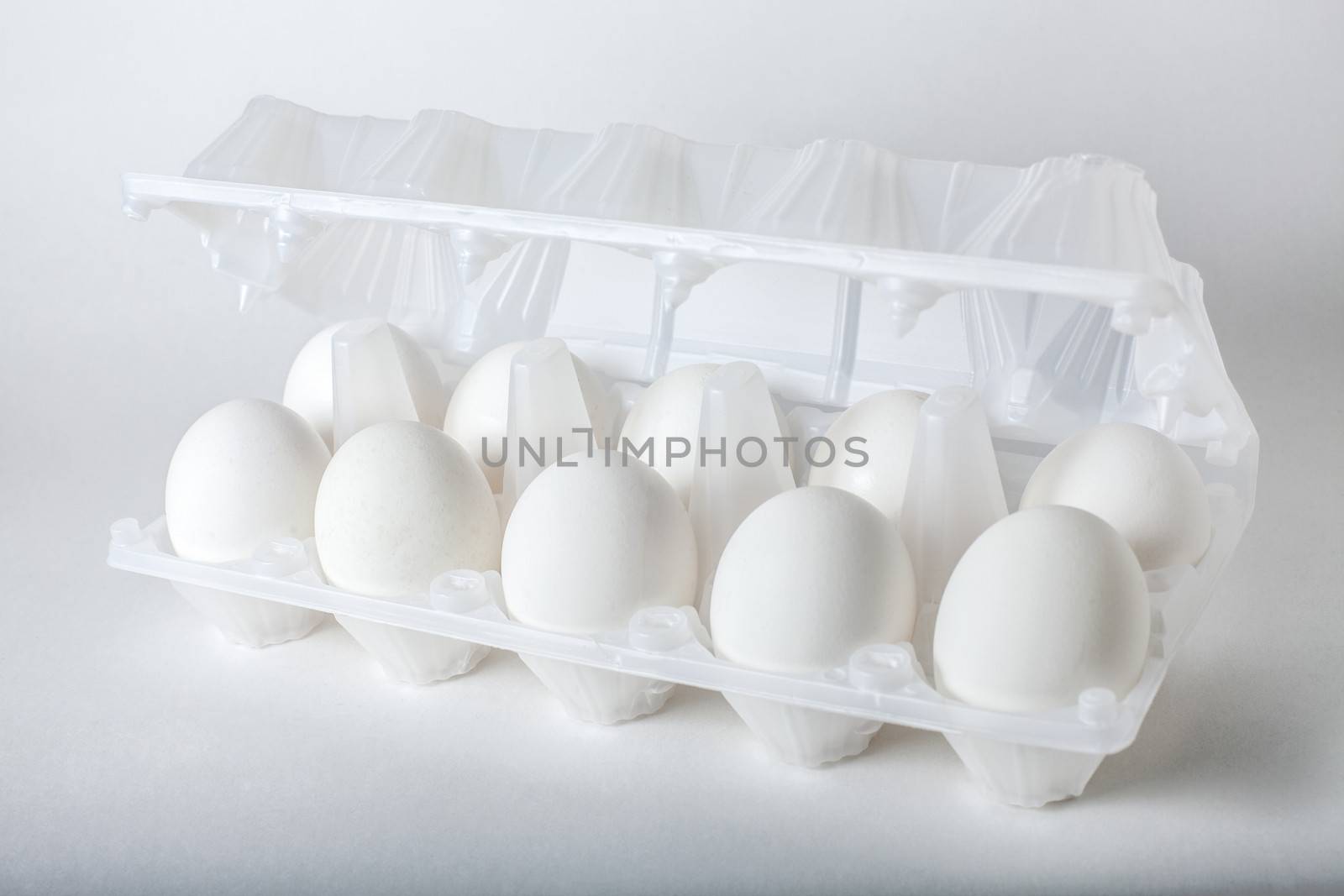 six eggs in a plastic egg box by anelina