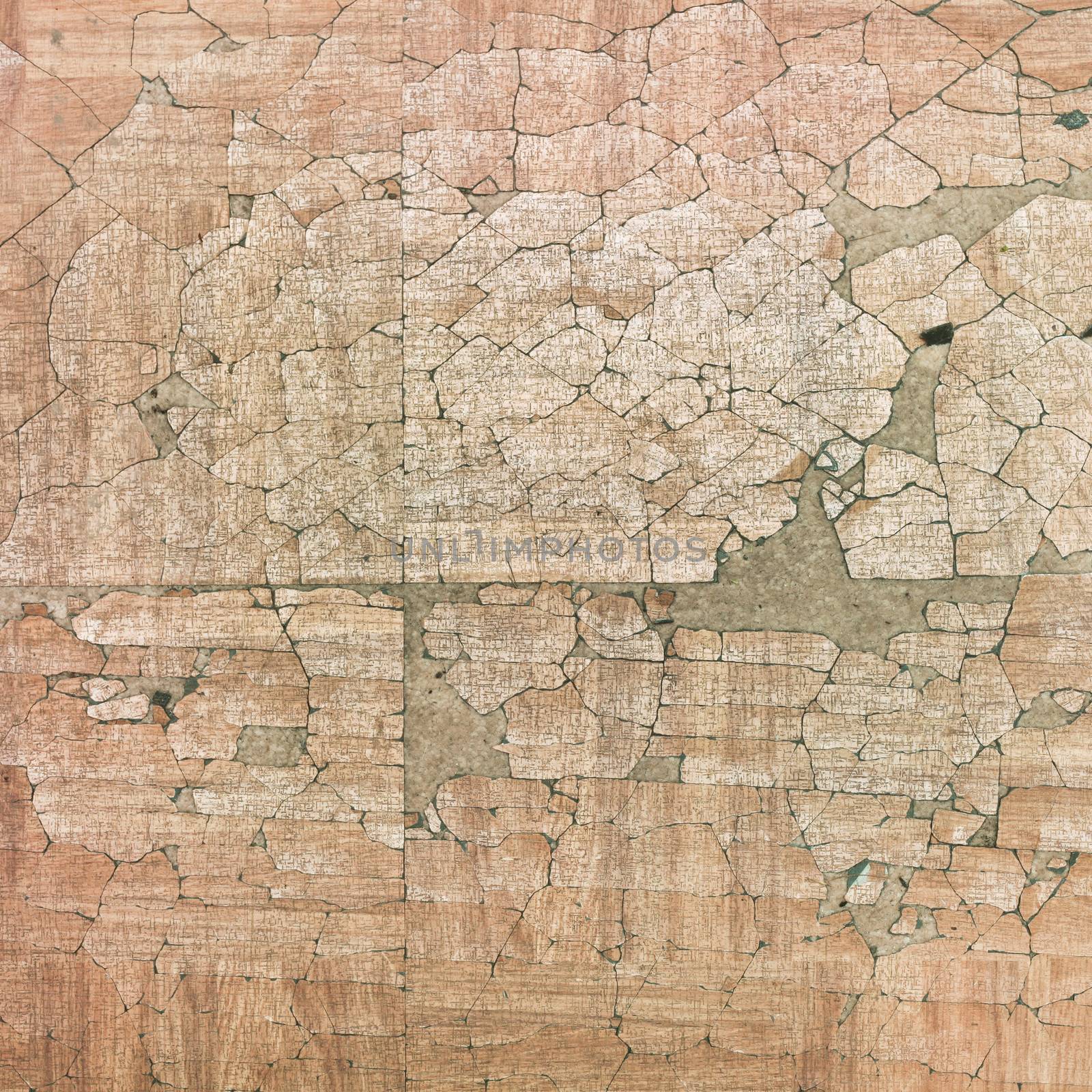 Chipped wooden veneer flooring as a background image