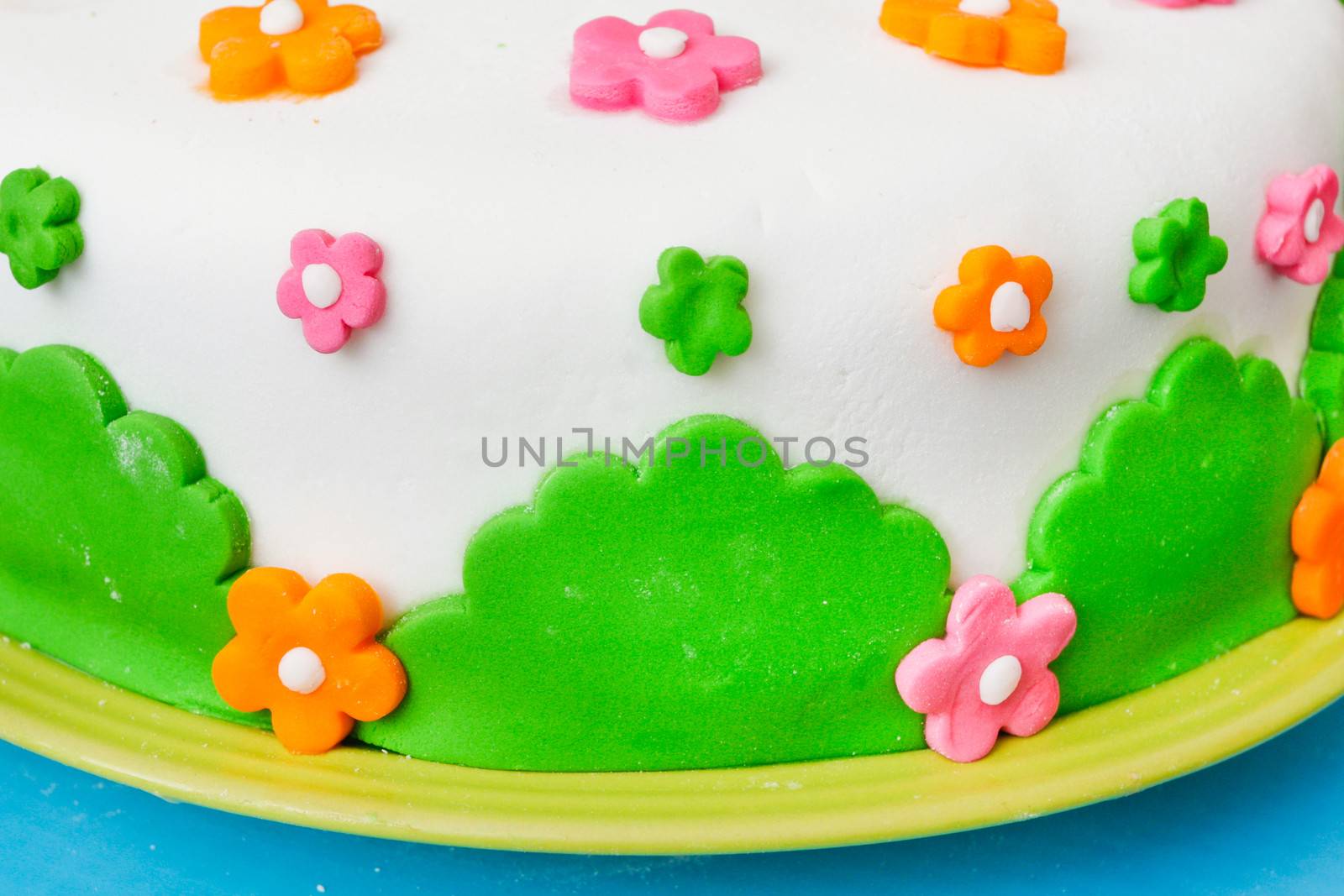 A brightly decorated birthday cake close up