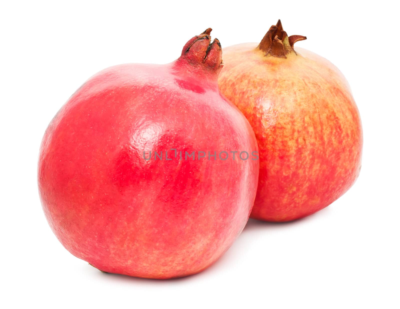 Fresh red pomegranate isolated on white background