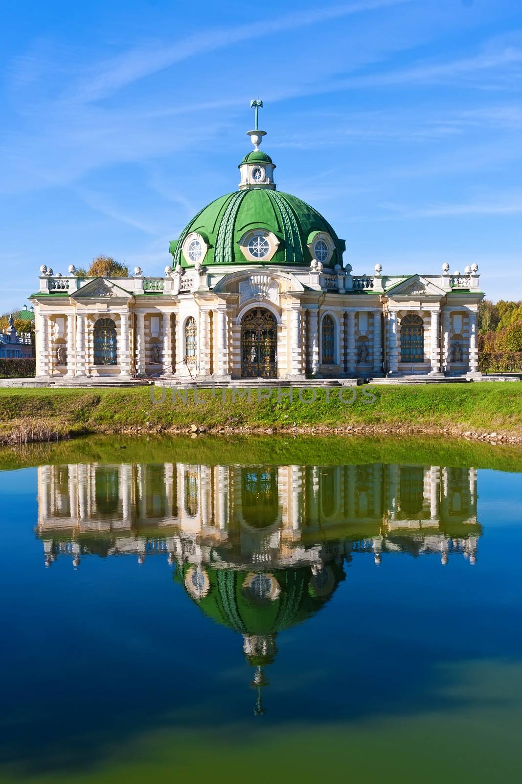 Grotto pavilion with beautiful reflection in park Kuskovo, Moscow, Russia