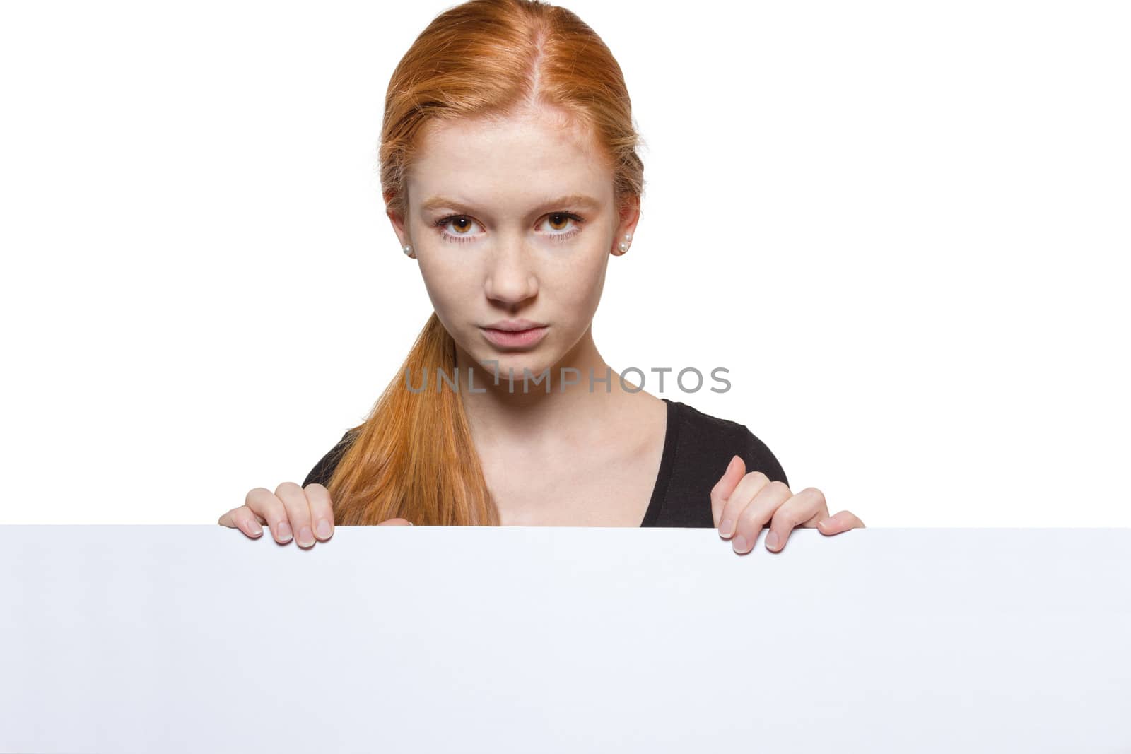 Teen girl holding a sign with copyspace for adverts by Cursedsenses