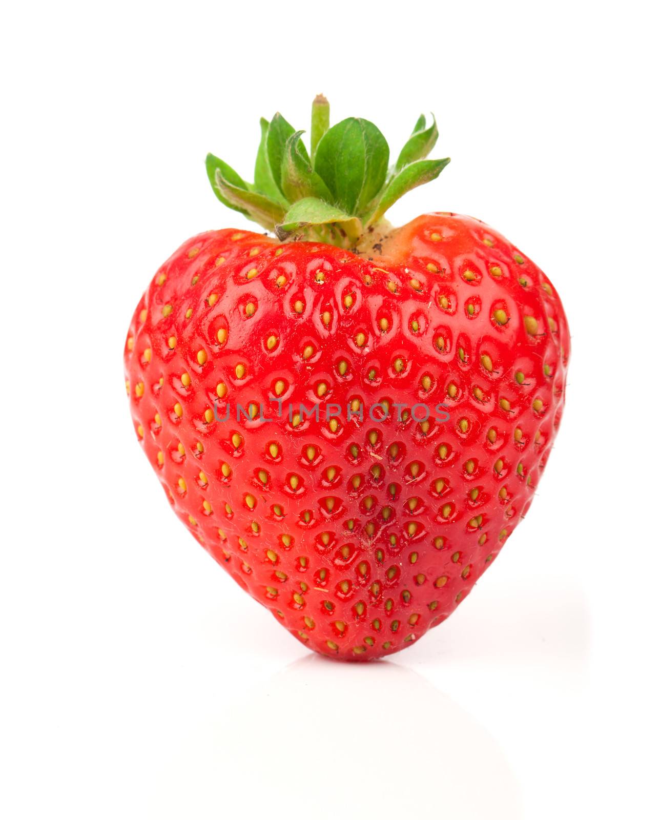 a heart shaped strawberry isolated on a white background