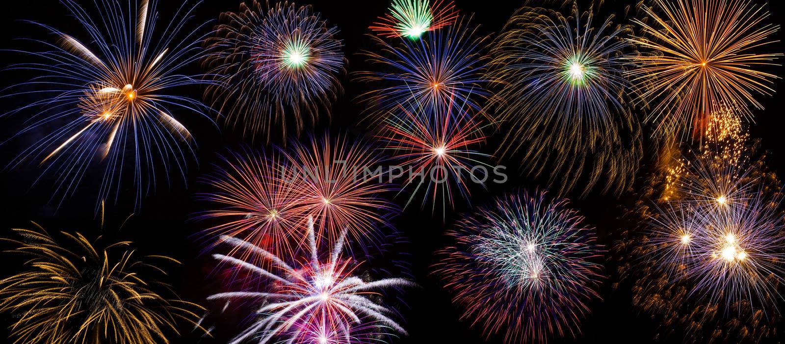 Very large background of fireworks that can be applied to virtually any landscape or city scape. The background is pure black so you can easily overlay it over your favorite landscape. This image is a composite of 9 separate photographs of real fireworks.