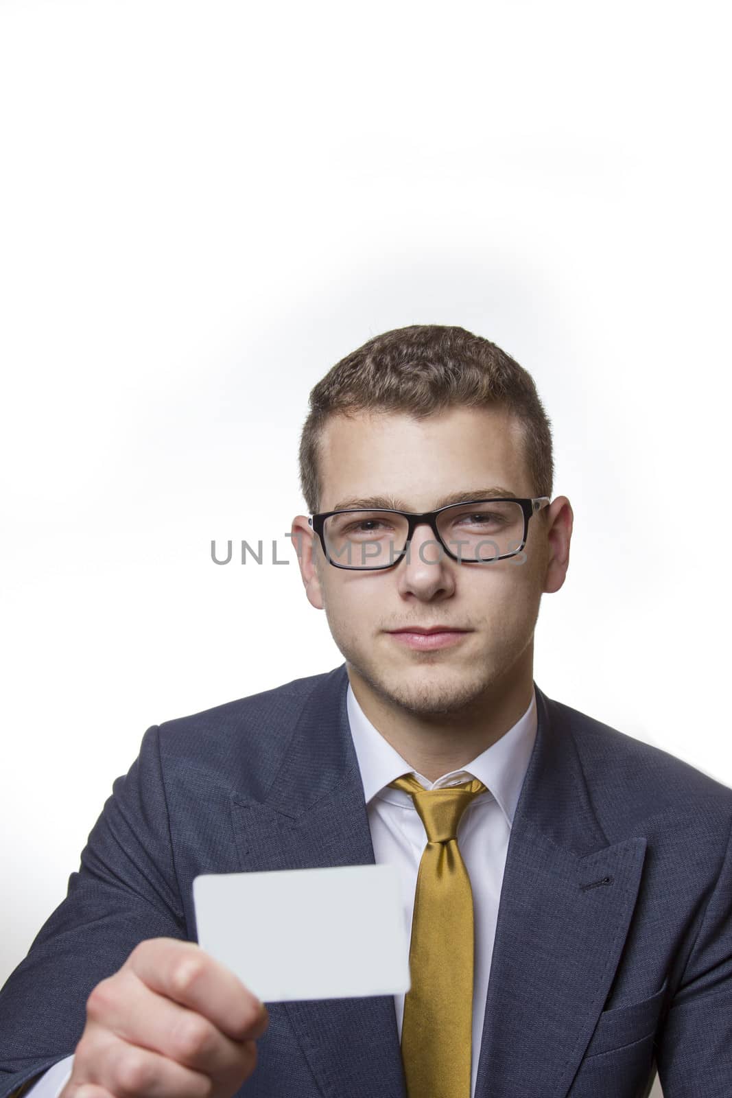 Businessman holding up white Businesscard with copy space