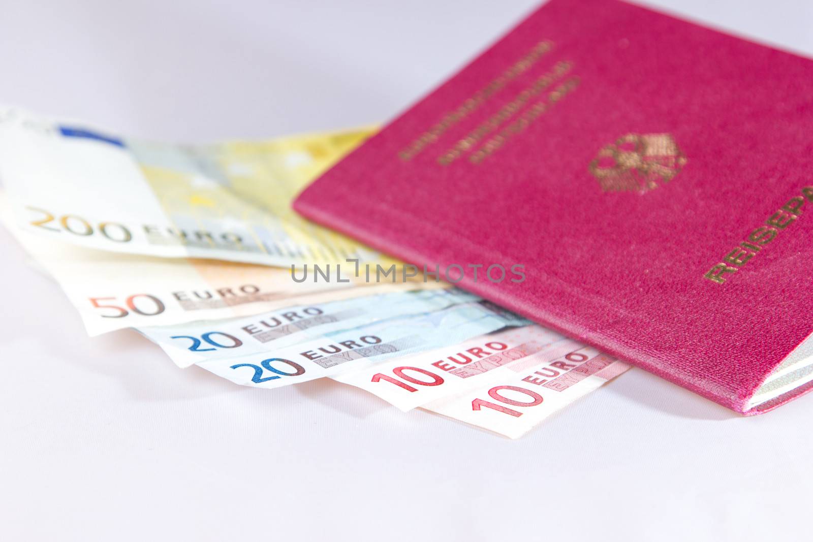 Euro Notes lying in the european passport from germany by Cursedsenses