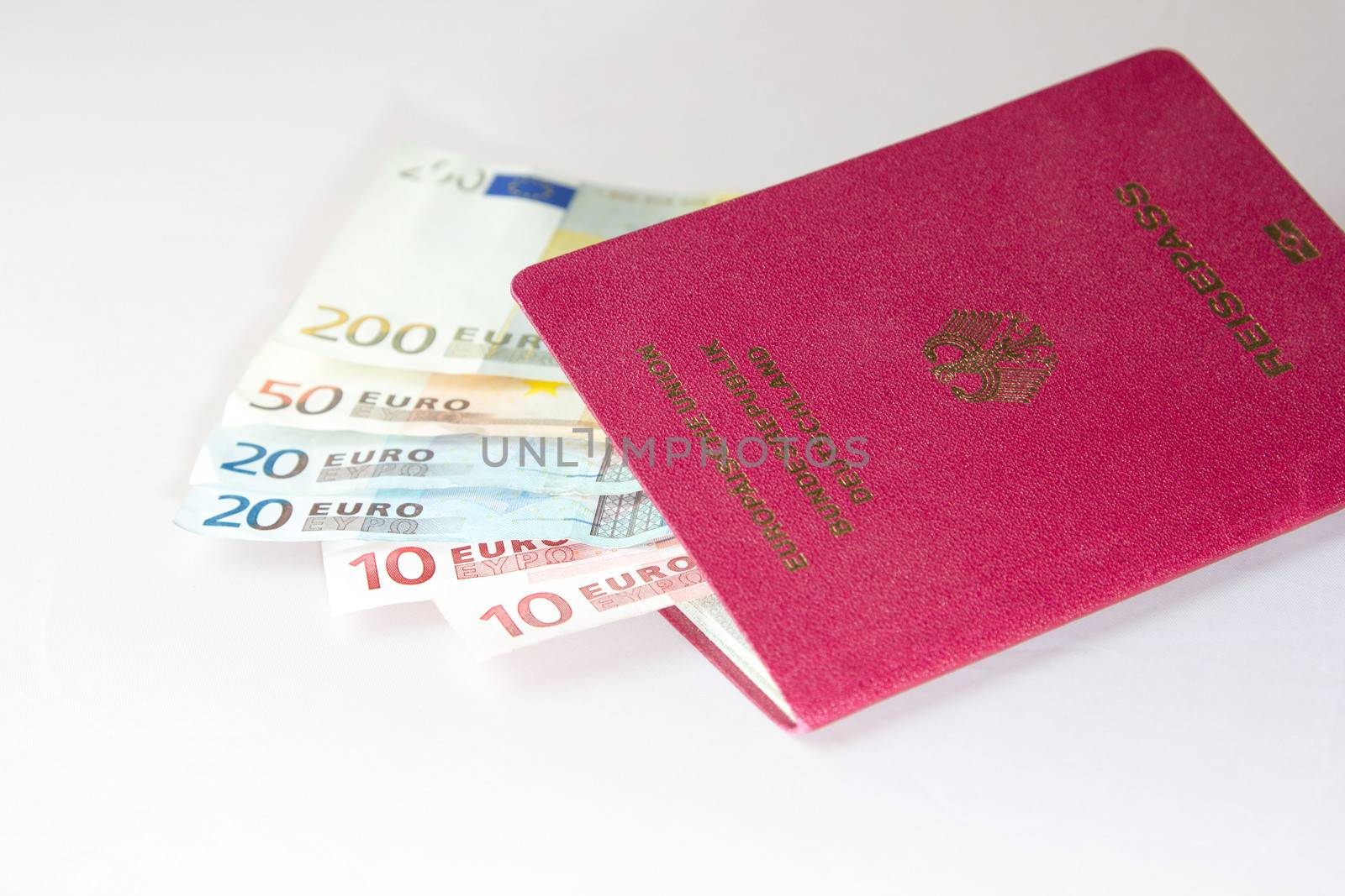 Euro Notes lying in the european passport from germany by Cursedsenses
