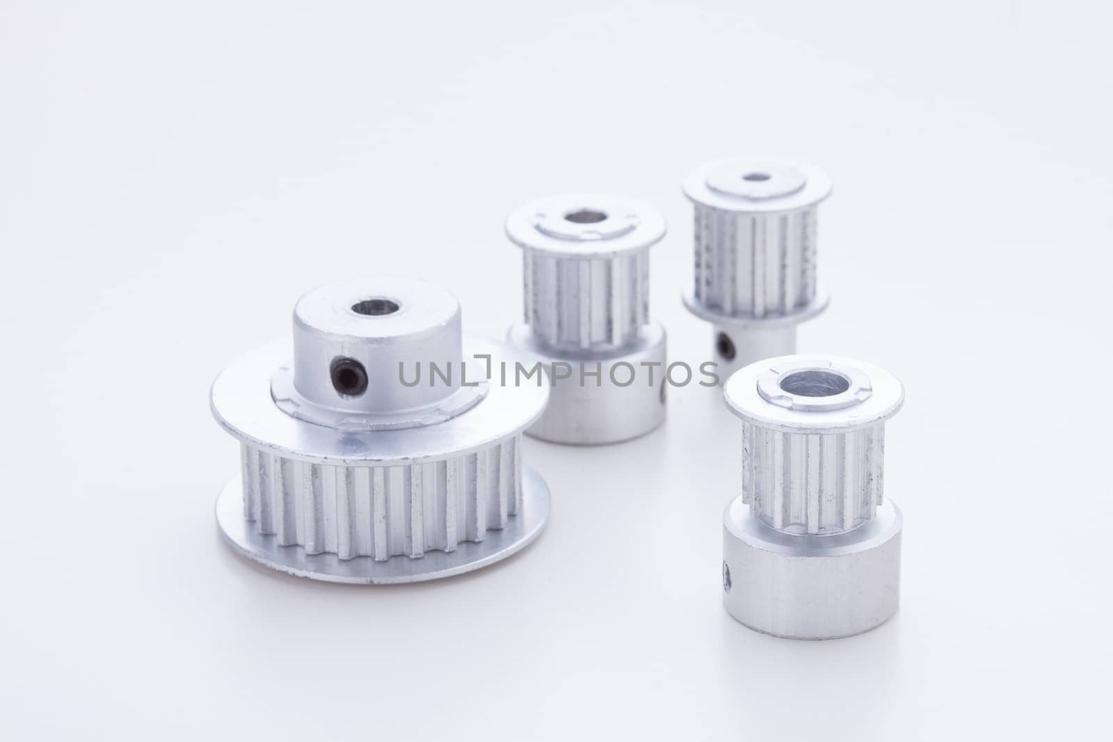 4 pulleys on white background