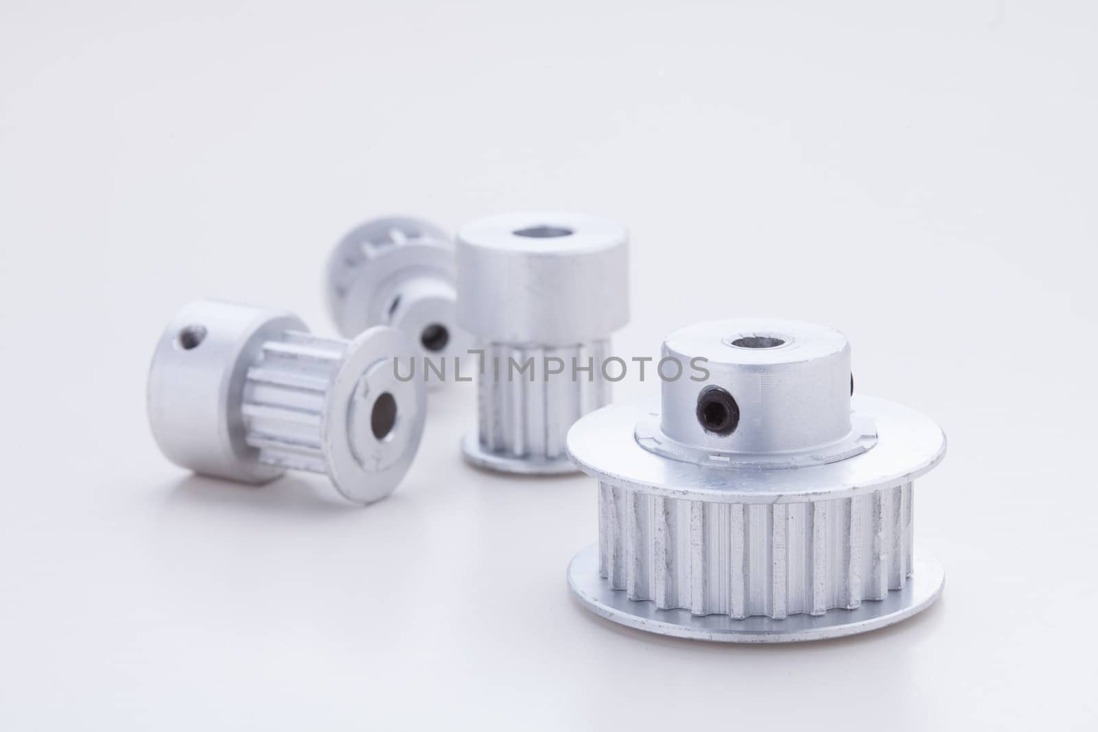 4 pulleys on white background