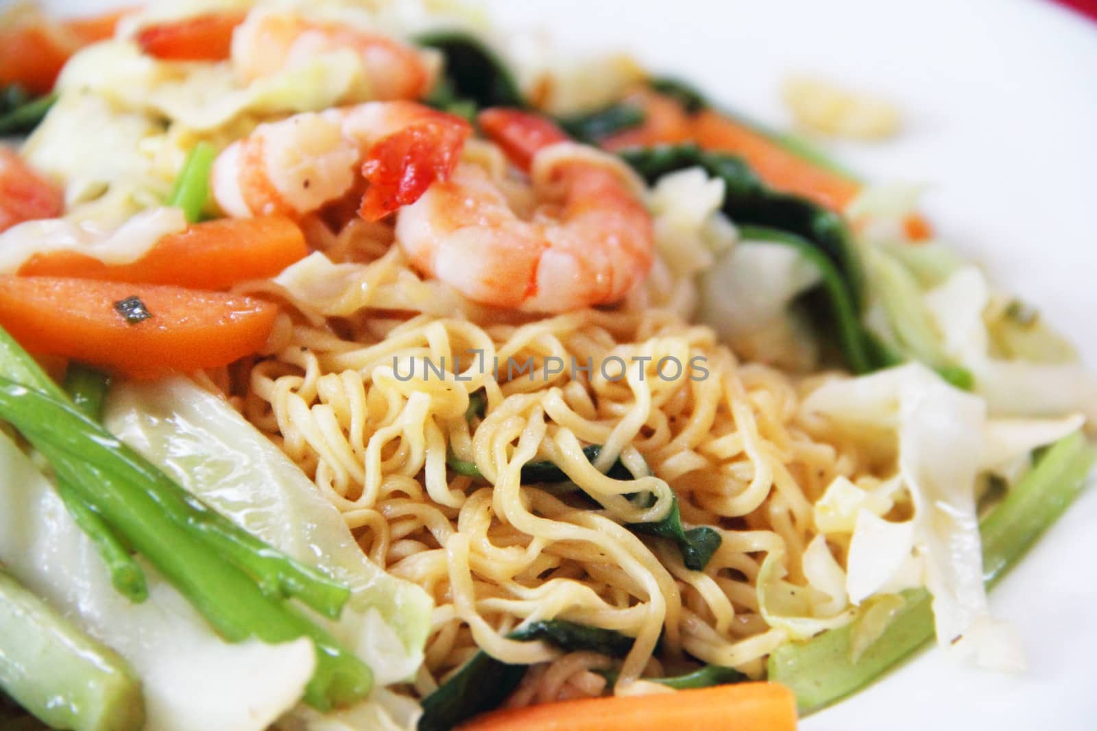 Trhaditional vietnam Noodles with shrimps and vegetables on plate
