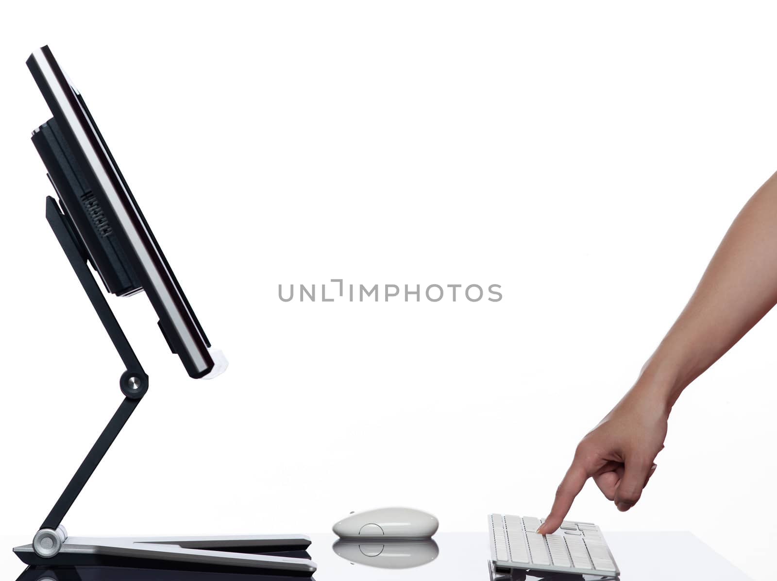communication between human hand and a computer display monitor on isolated white background expressing computing concept