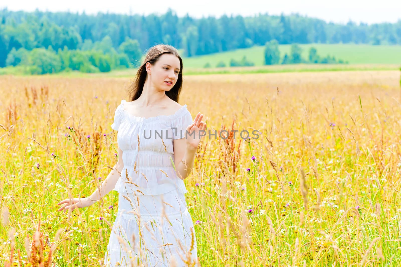 charming brunette in a field of yellow flowers by kosmsos111