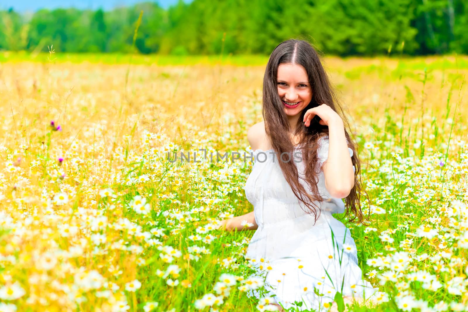 smiling girl in camomile field rests by kosmsos111