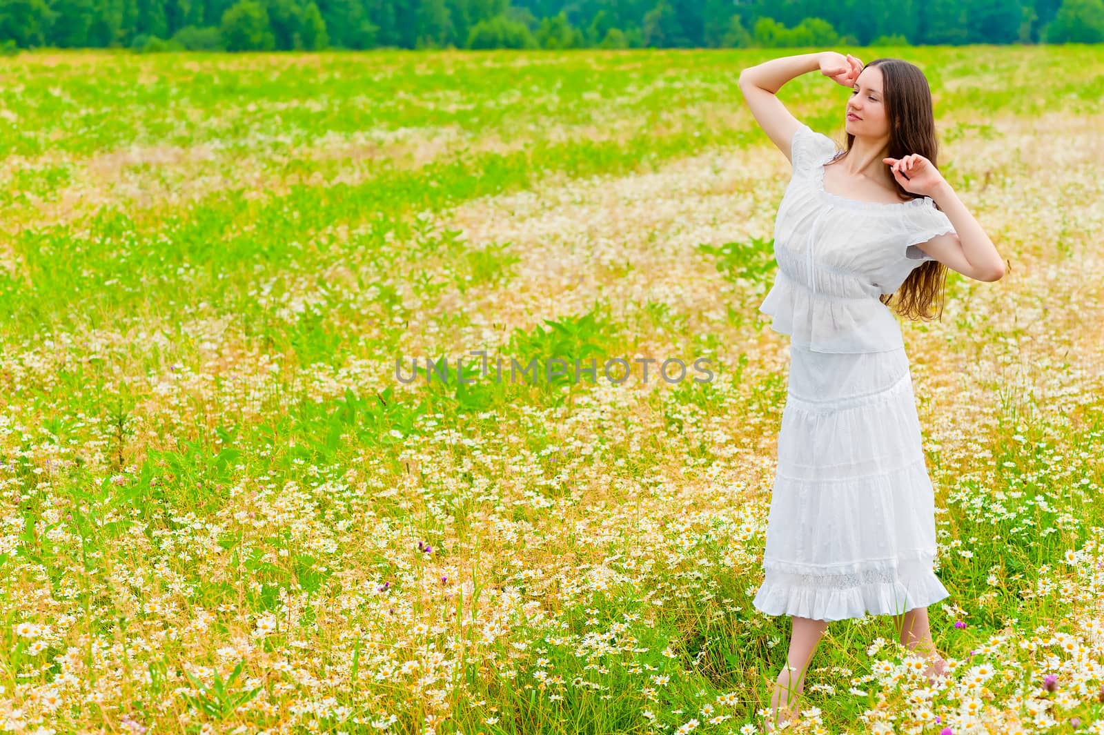 young brunette woman walking in a field with daisies by kosmsos111