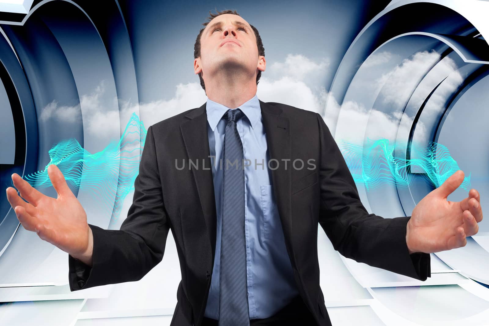 Composite image of businessman posing with arms out by Wavebreakmedia