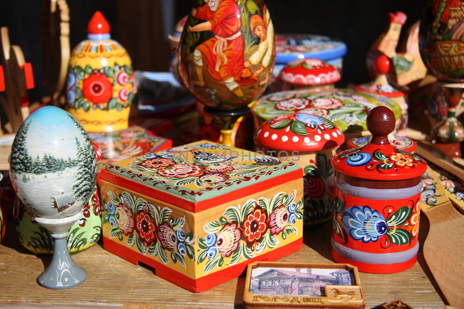 Traditional Russian wooden painted souvenirs from ancient town Gorodets