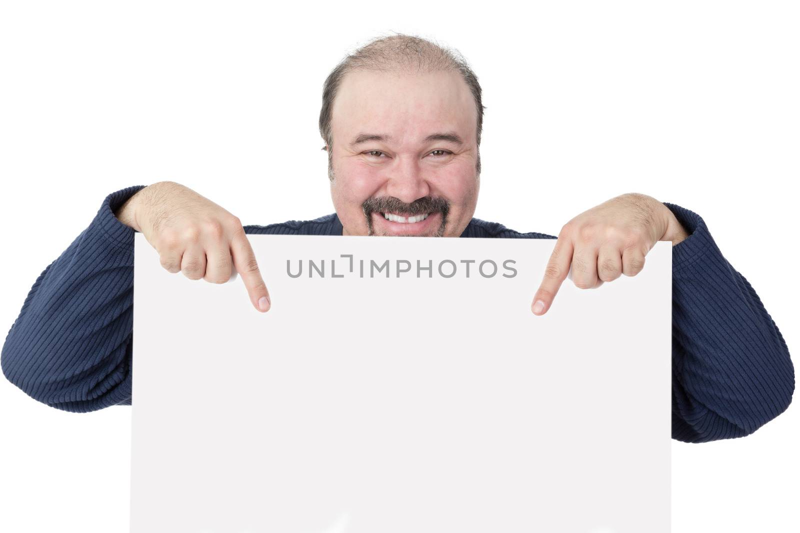 Motivated businessman holding a blank white sign by coskun
