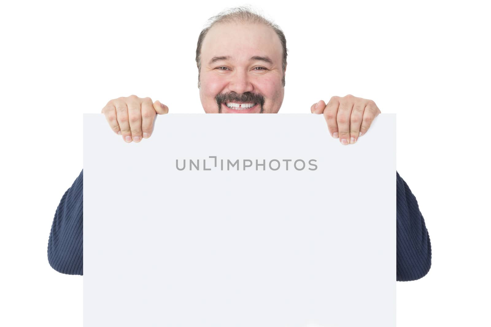 Happy mature man holding a blank billboard by coskun
