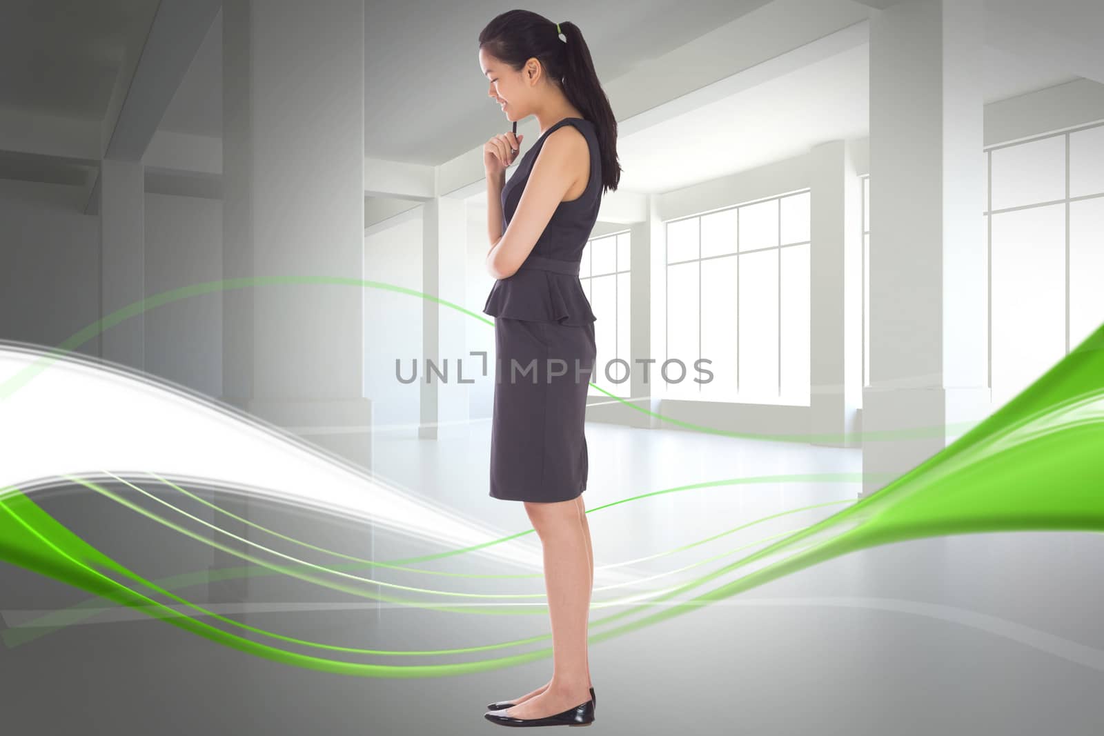 Composite image of thoughtful businesswoman by Wavebreakmedia