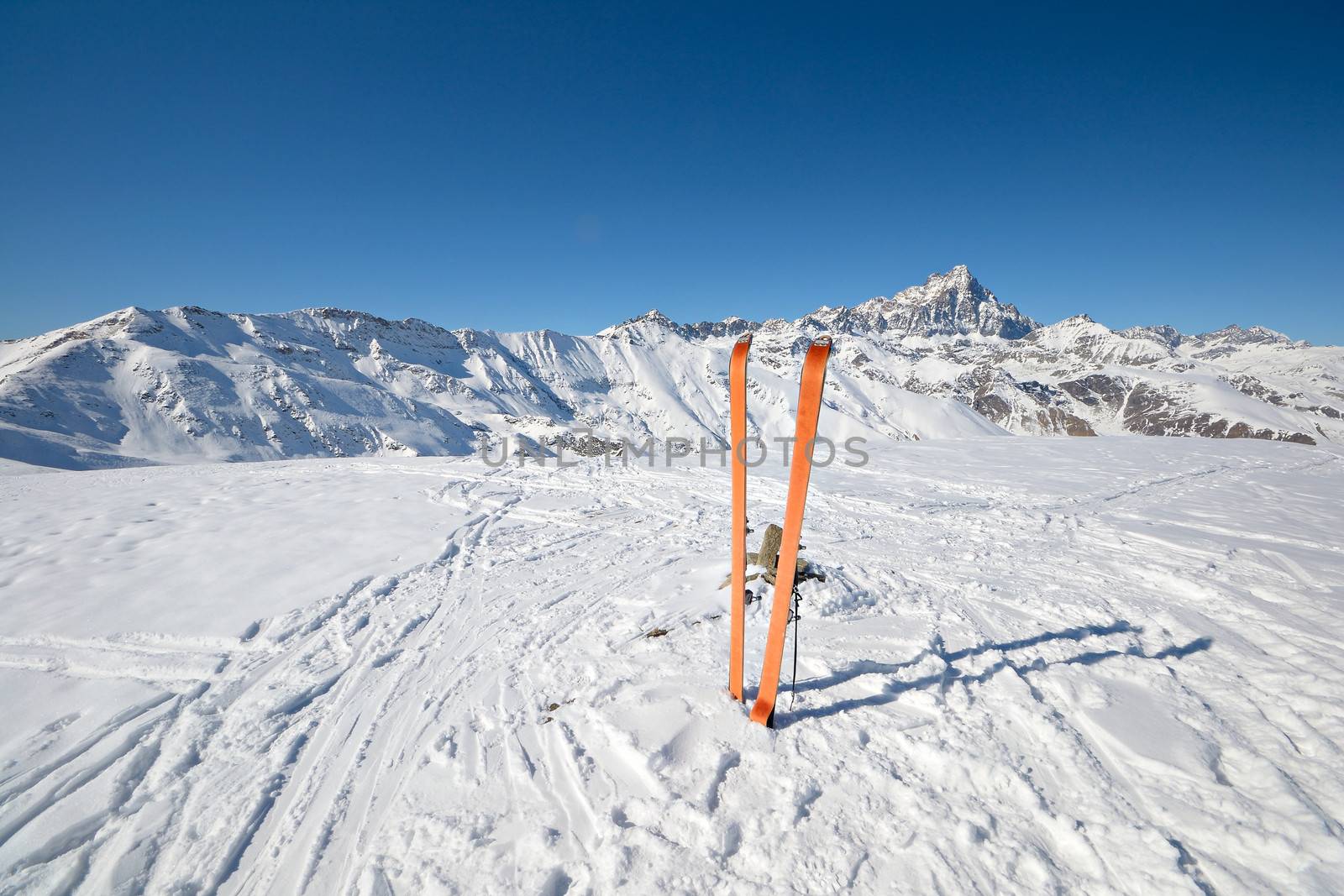 Back country ski in scenic alpine backgrounds