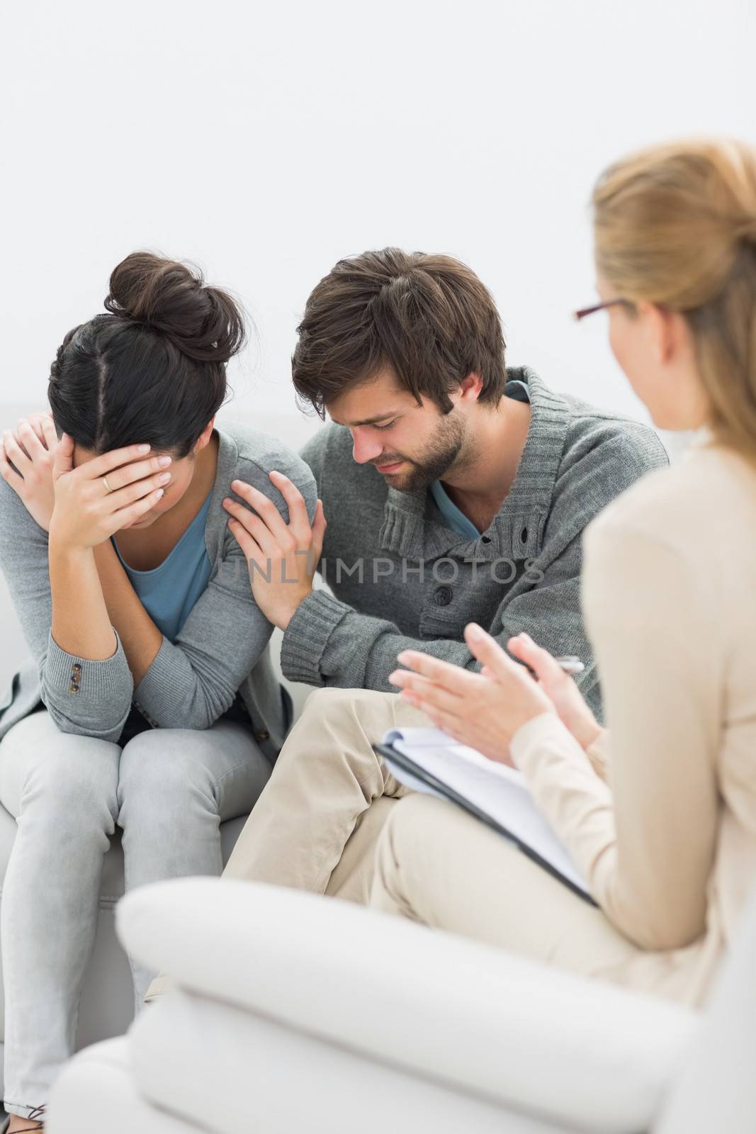 Couple in meeting with a relationship counselor in her office