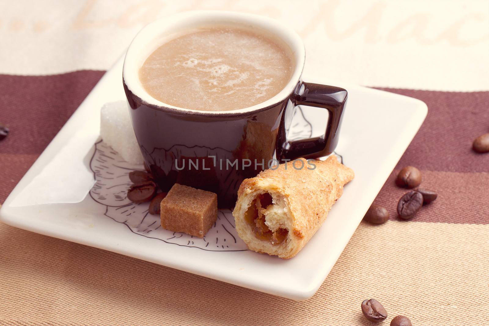 Coffee served with croissant and sfogliatella