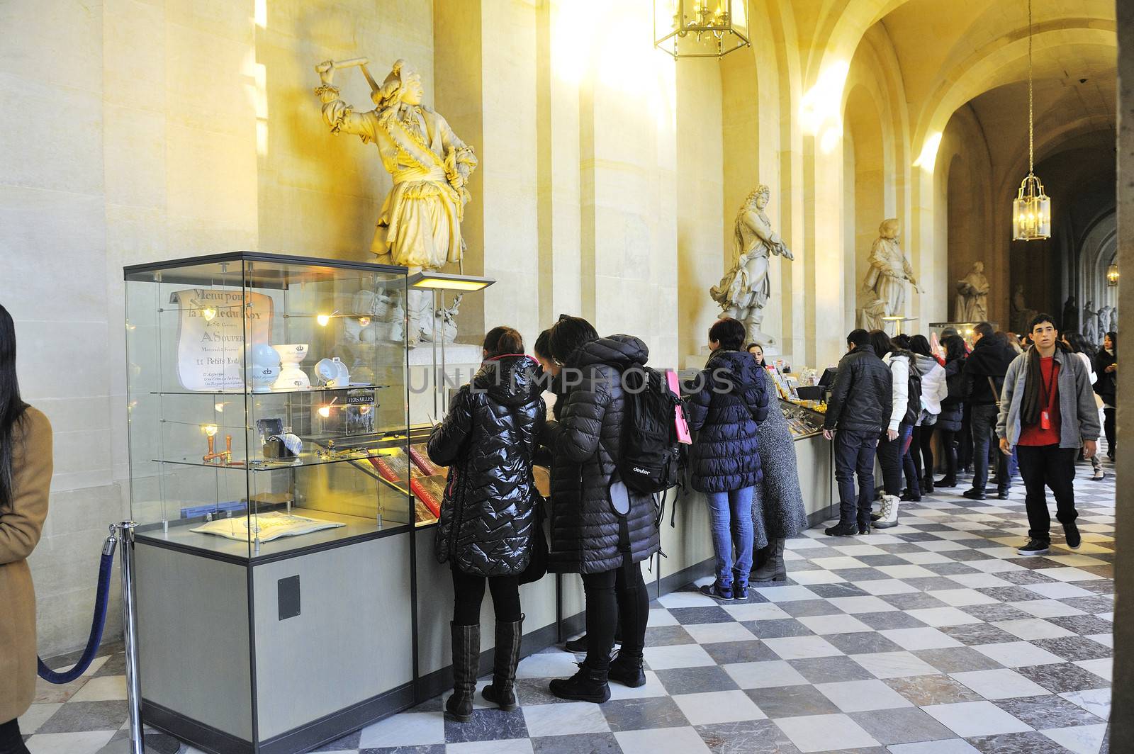 Tourists at the souvenir shop in the castle of Versailles