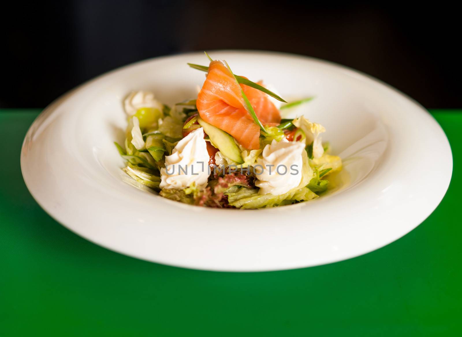 Smoked salmon with cream and salad by stockyimages