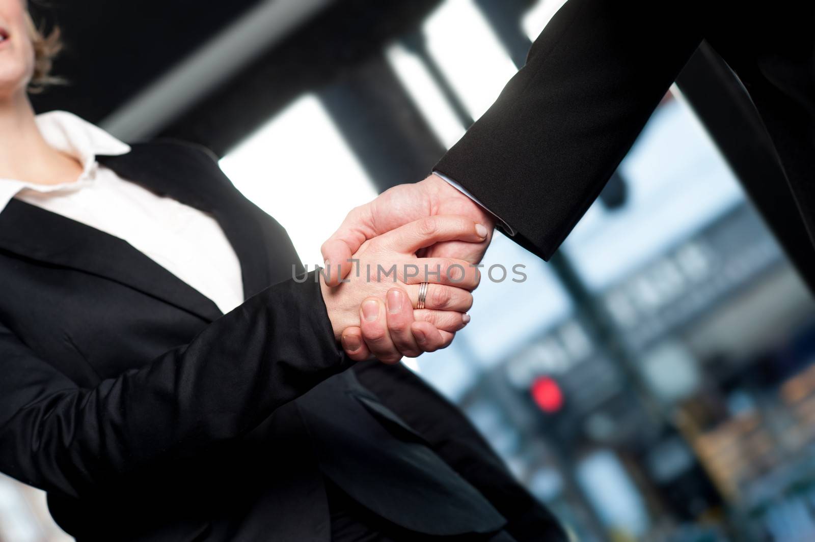 Business handshake, deal finalized by stockyimages