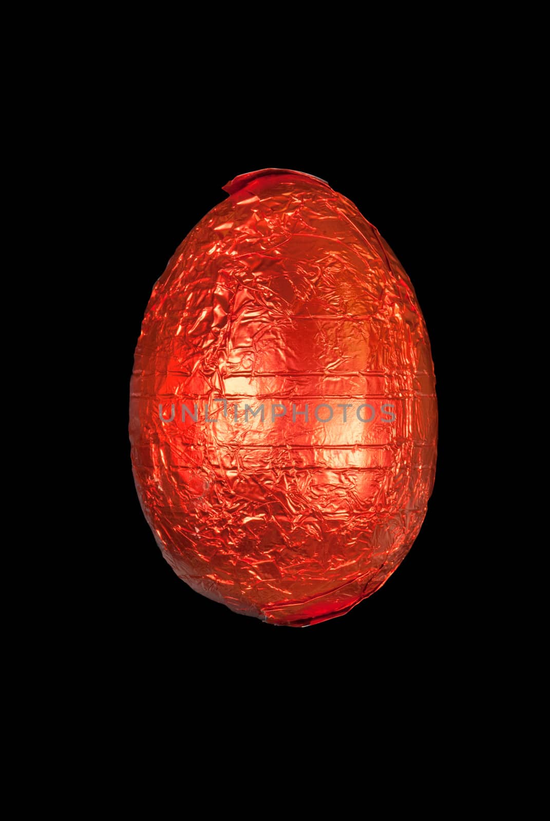 Close-up of an orange chocolate Easter egg.