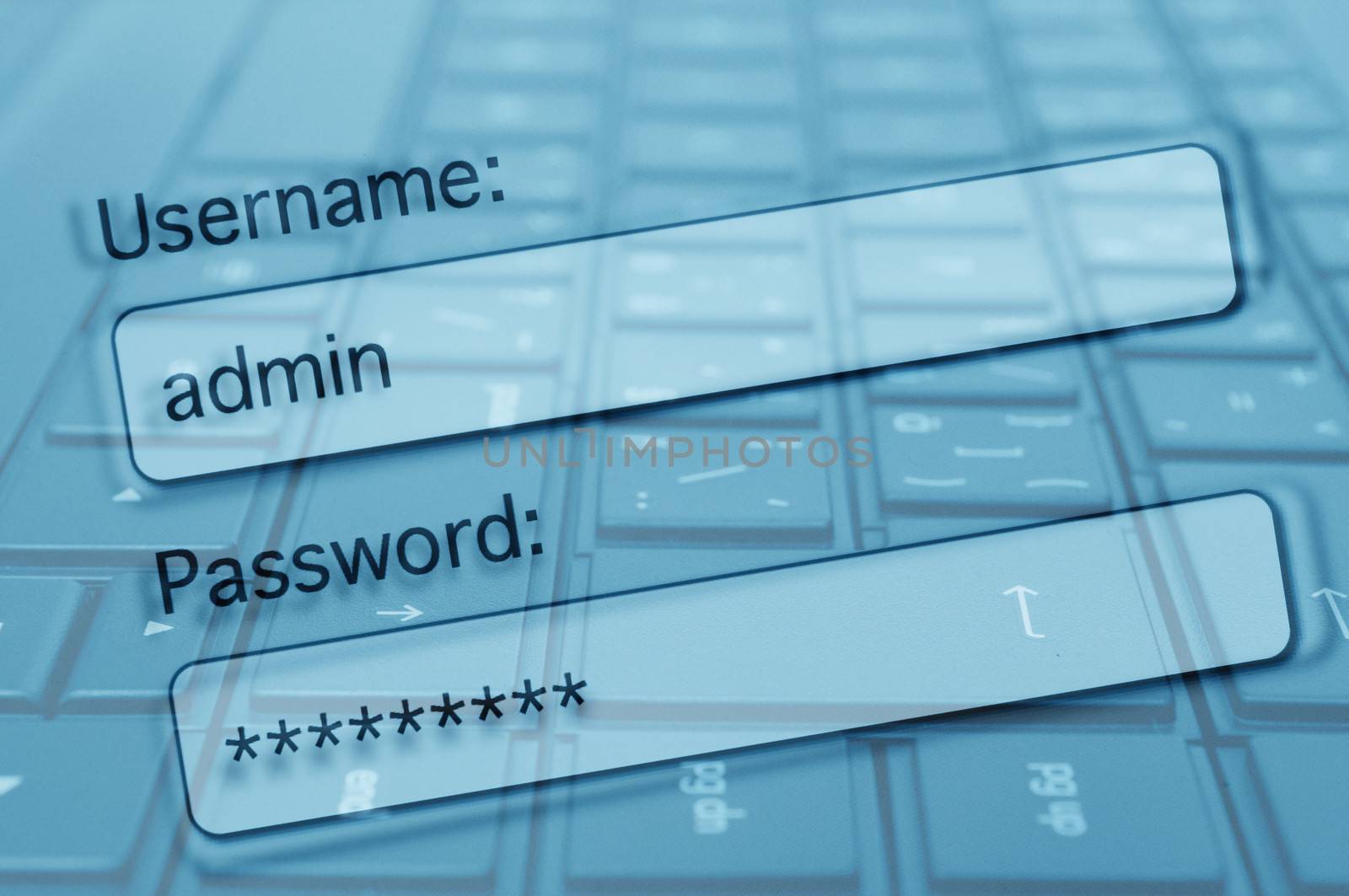 Internet Security Concept - Login Box With Filled-in Username and Password in Internet Browser. Computer Keyboard in Background.