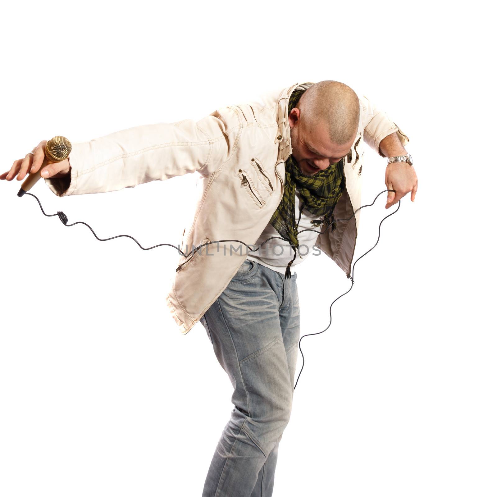 rock singer dancing with microphone on a white background