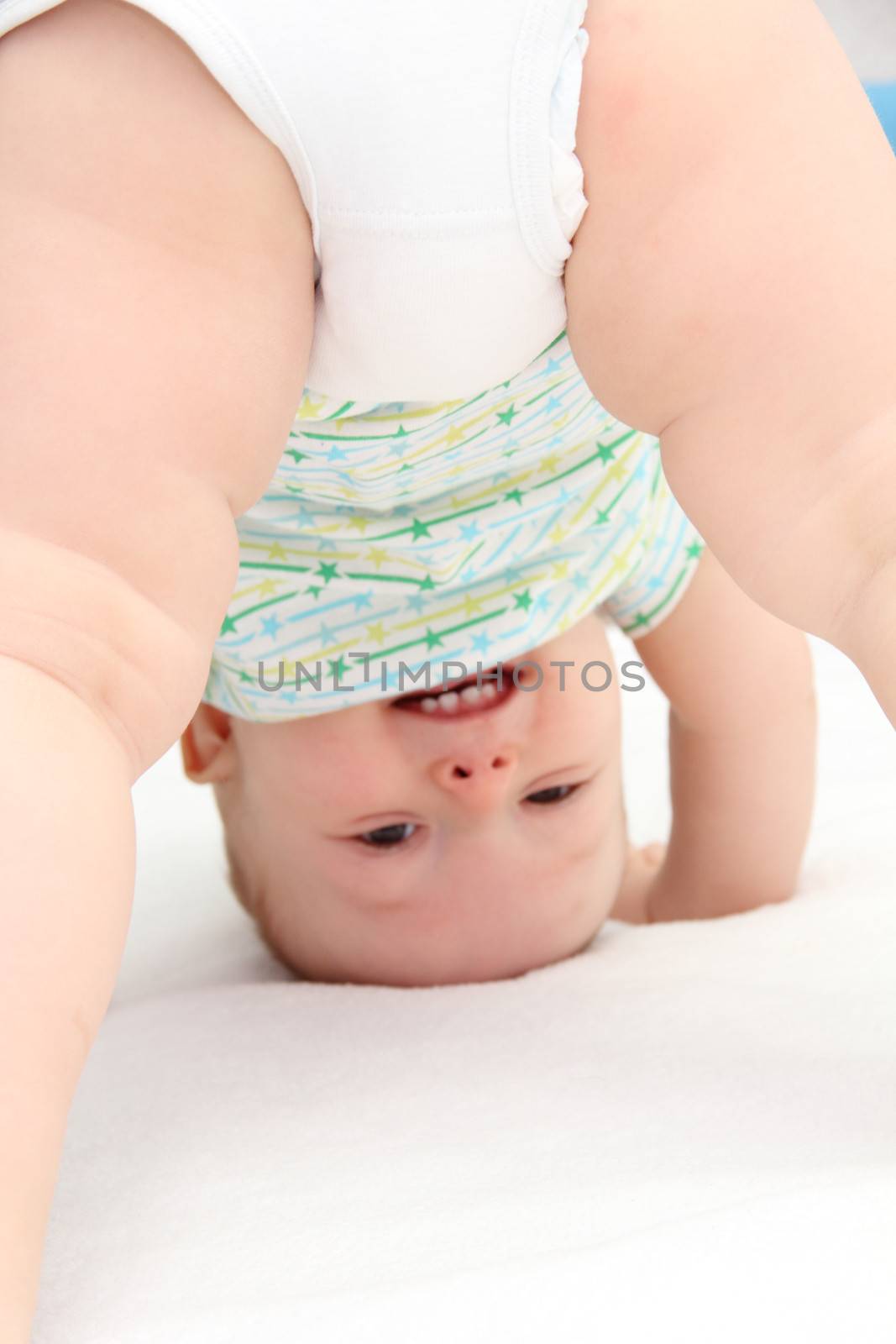 baby standing on head