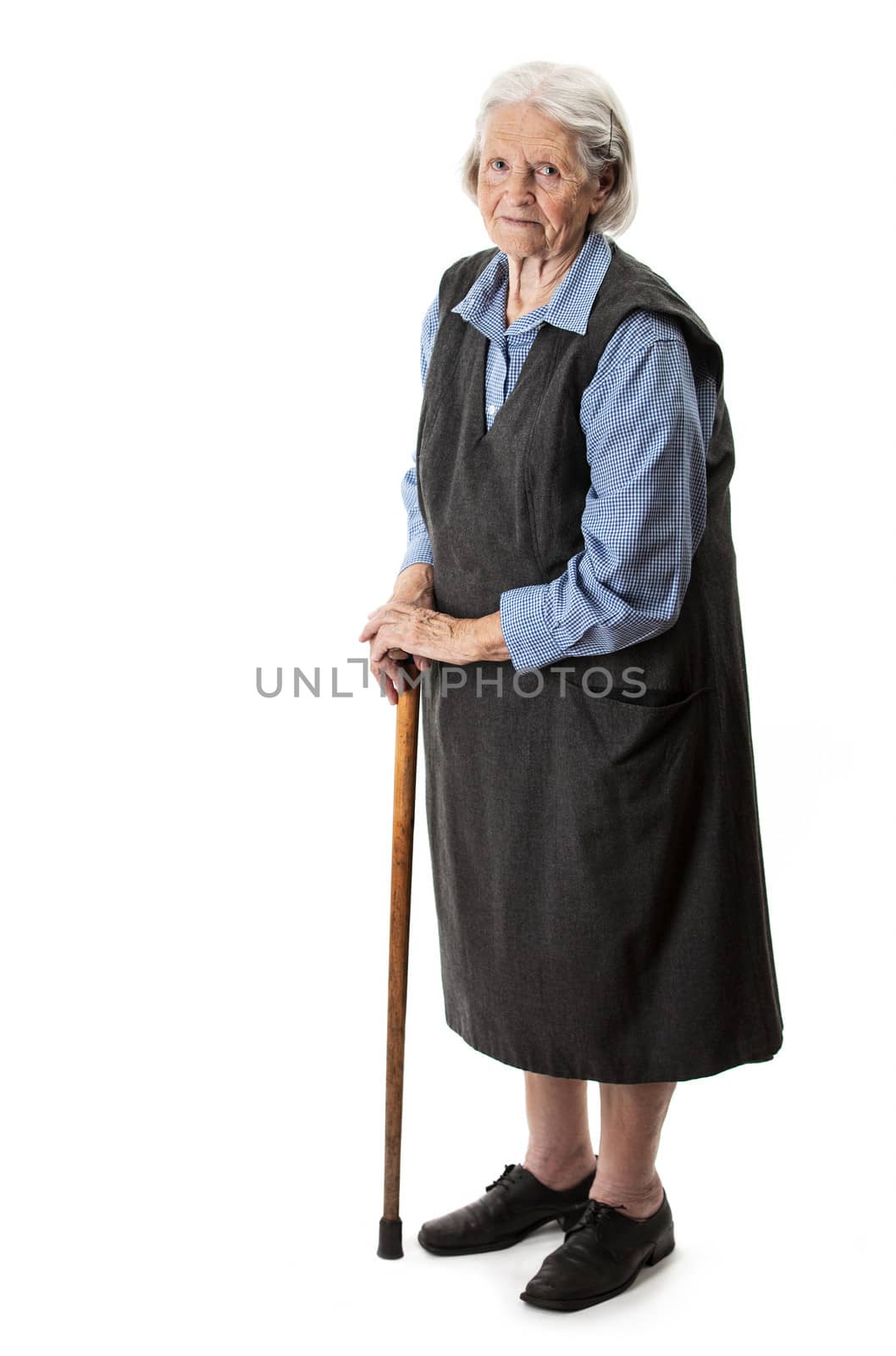 Old woman with a cane on a white background