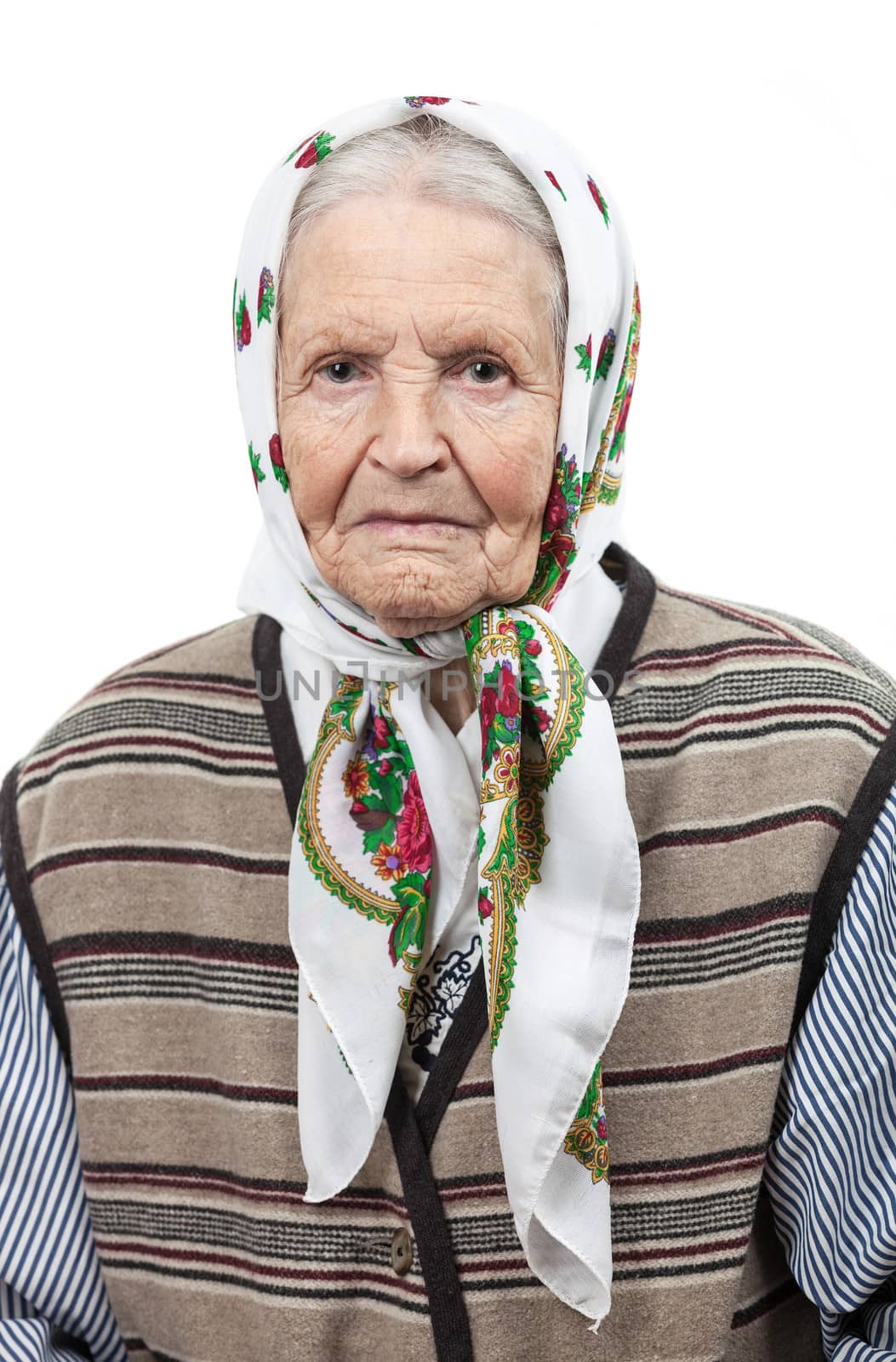Portrait of a senior woman in headscarf by photobac