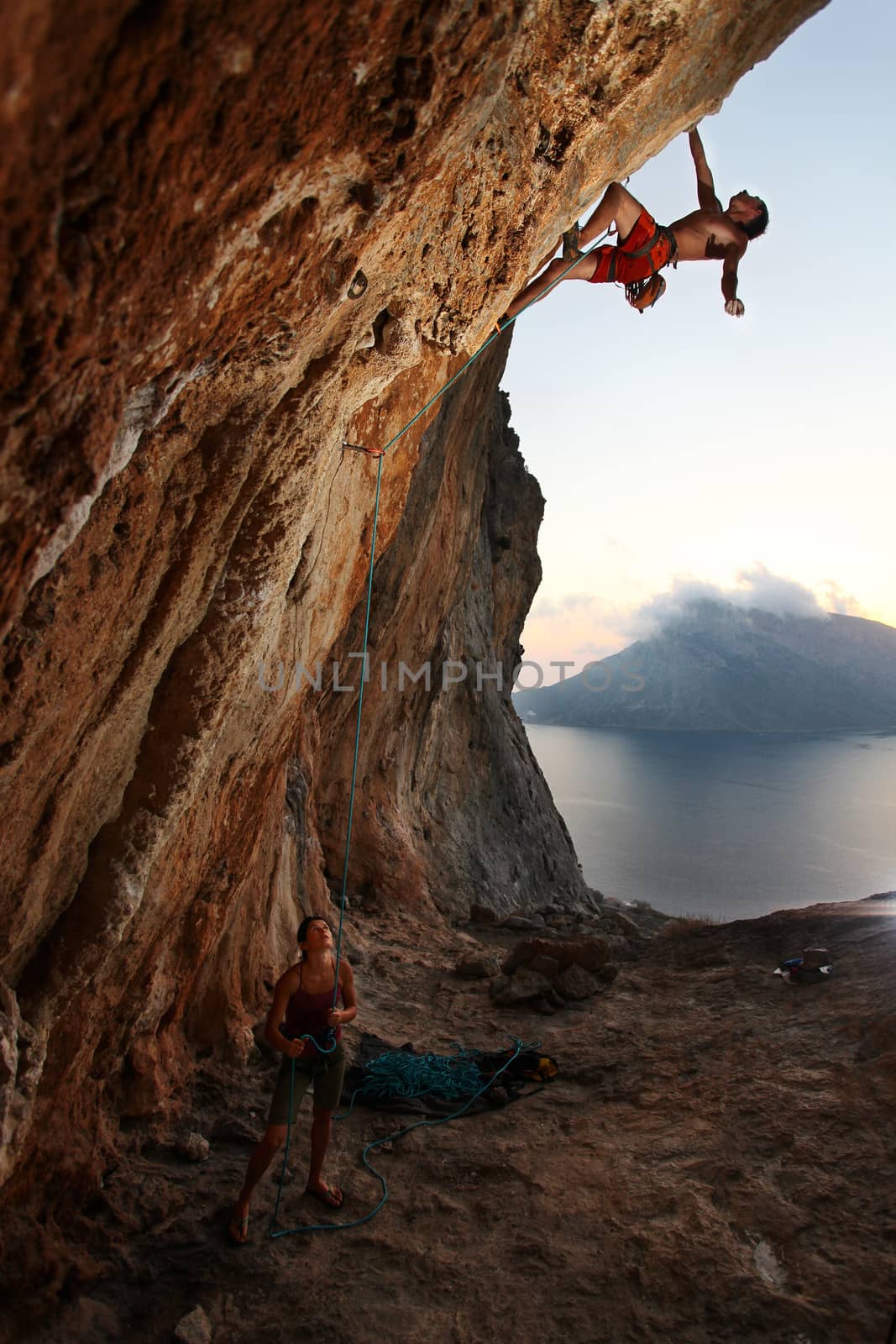 Rock climber at a sunset. Kalymnos Island, Greece.