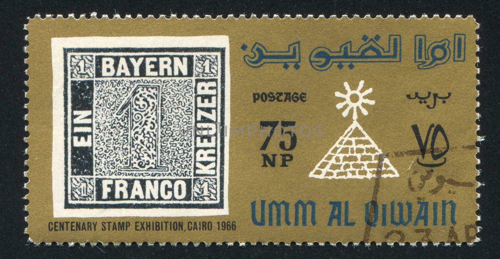 UMM AL-QUWAIN - CIRCA 1966: stamp printed by Umm al-Quwain, shows Stamp and Pyramid, circa 1966