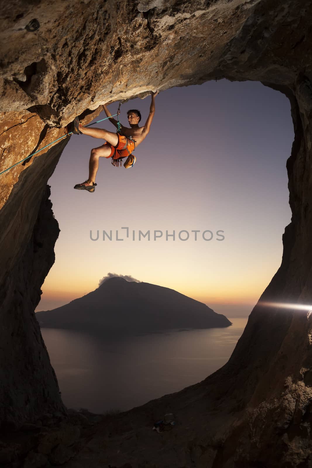 Rock climber at a sunset. Kalymnos Island, Greece