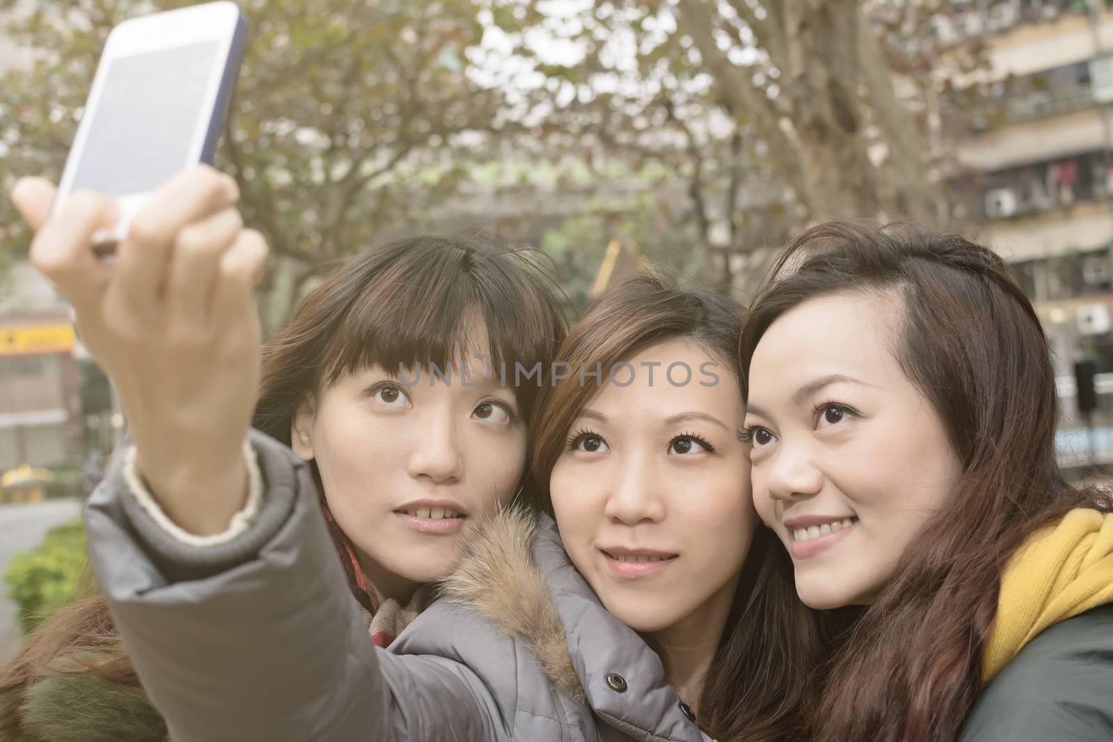Asian women take picture by themselves. by elwynn