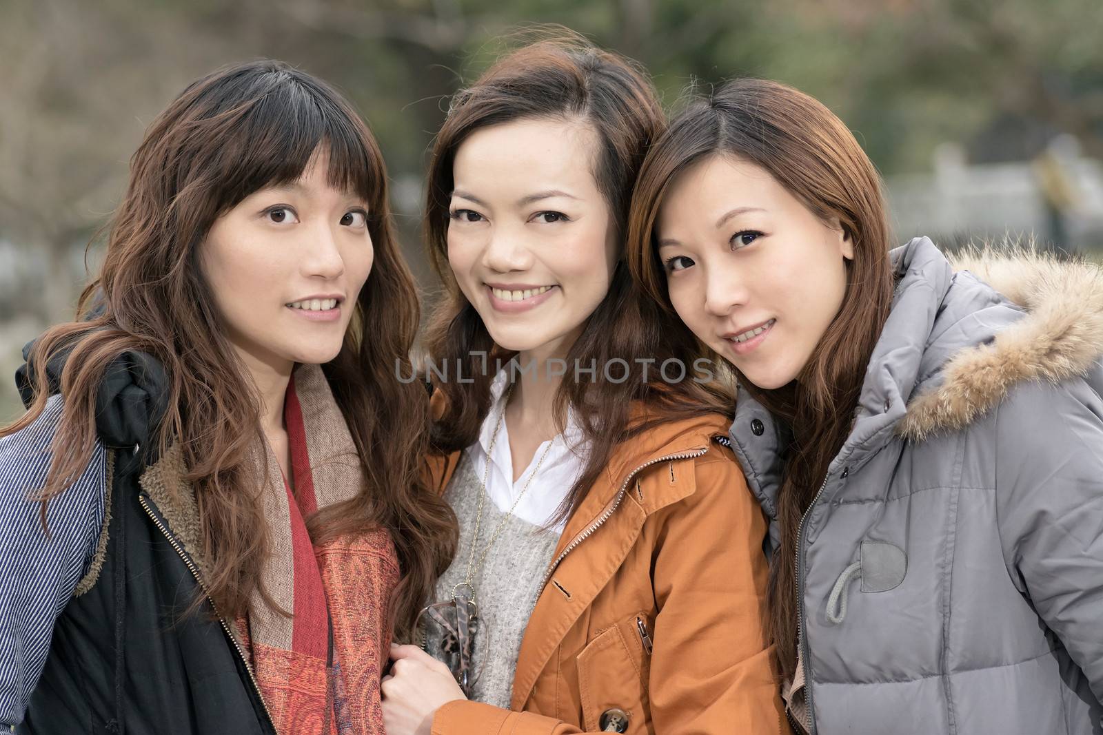 Happy smiling Asian women in the park, taipei, Taiwan.