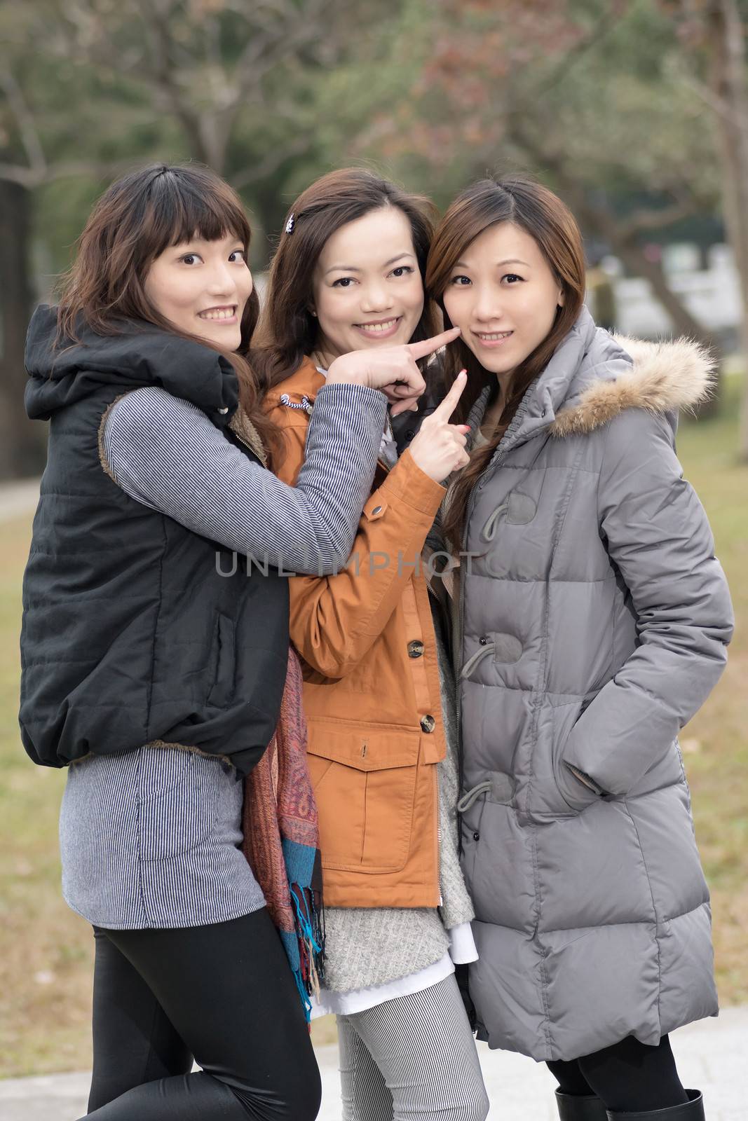 Happy smiling Asian women in the park, taipei, Taiwan.