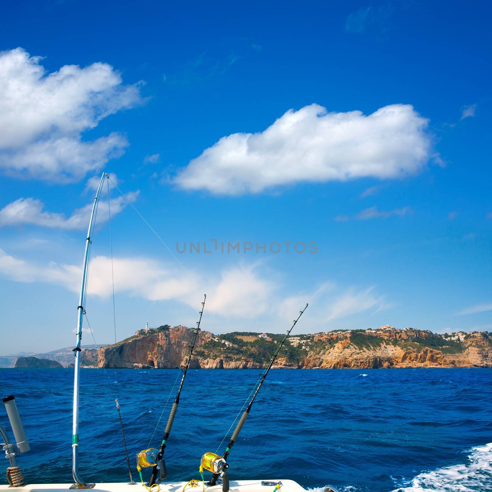 Fishing trolling boat rods in Mediterranean Cabo Nao Cape by lunamarina