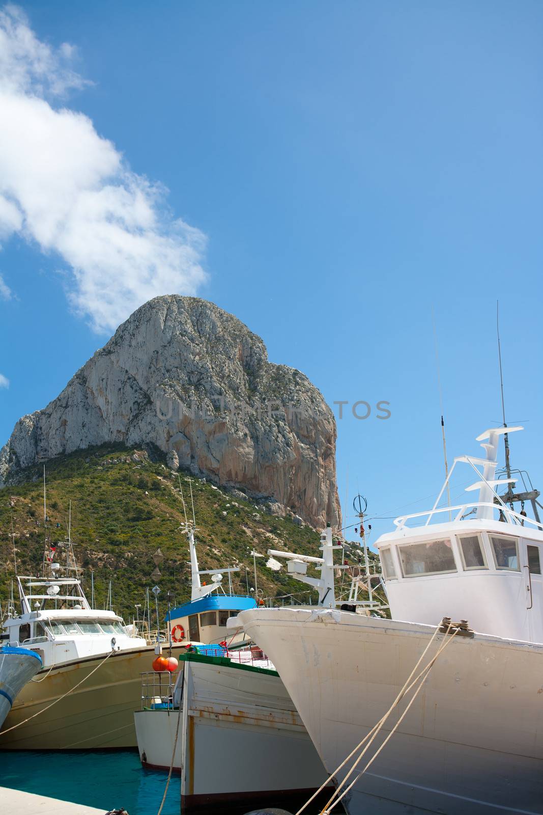 Calpe Alicante fisherboats with Penon de Ifach in Mediterranean Spain