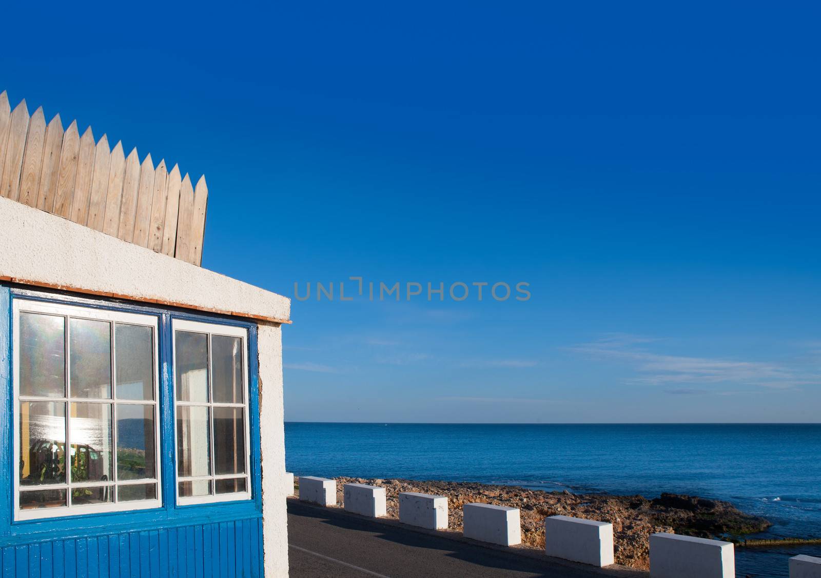 Denia Las Rotas blue house in Mediterranean sea by lunamarina