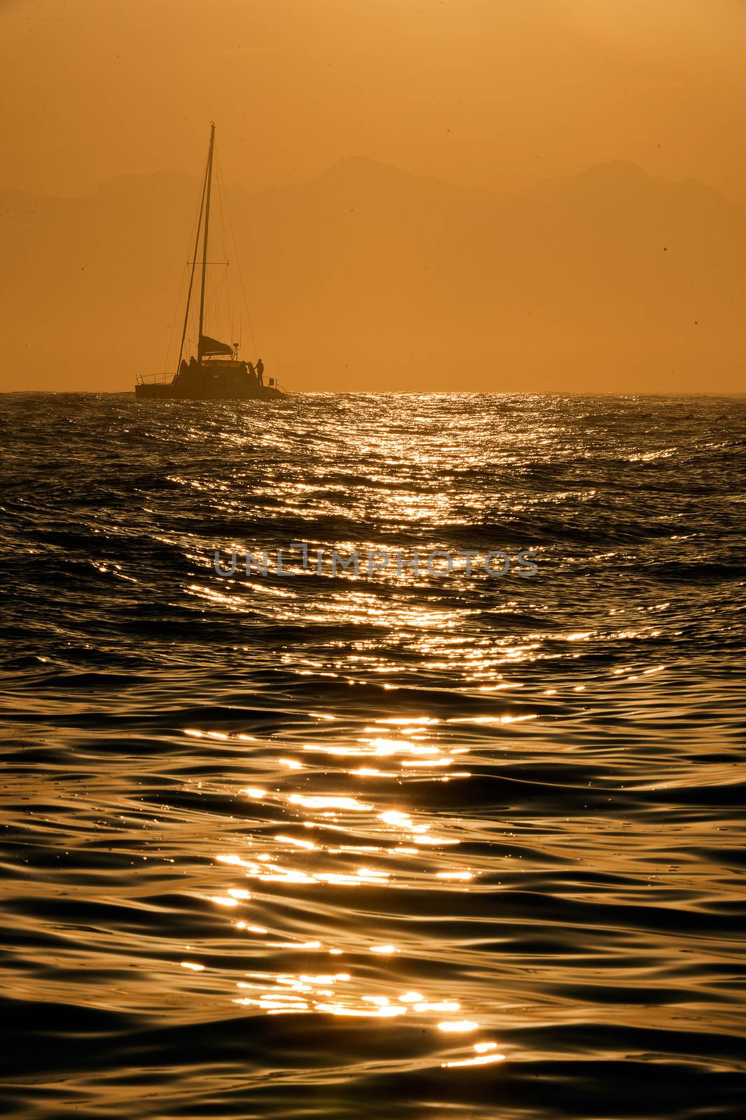 Sailboat at sunrise by SURZ