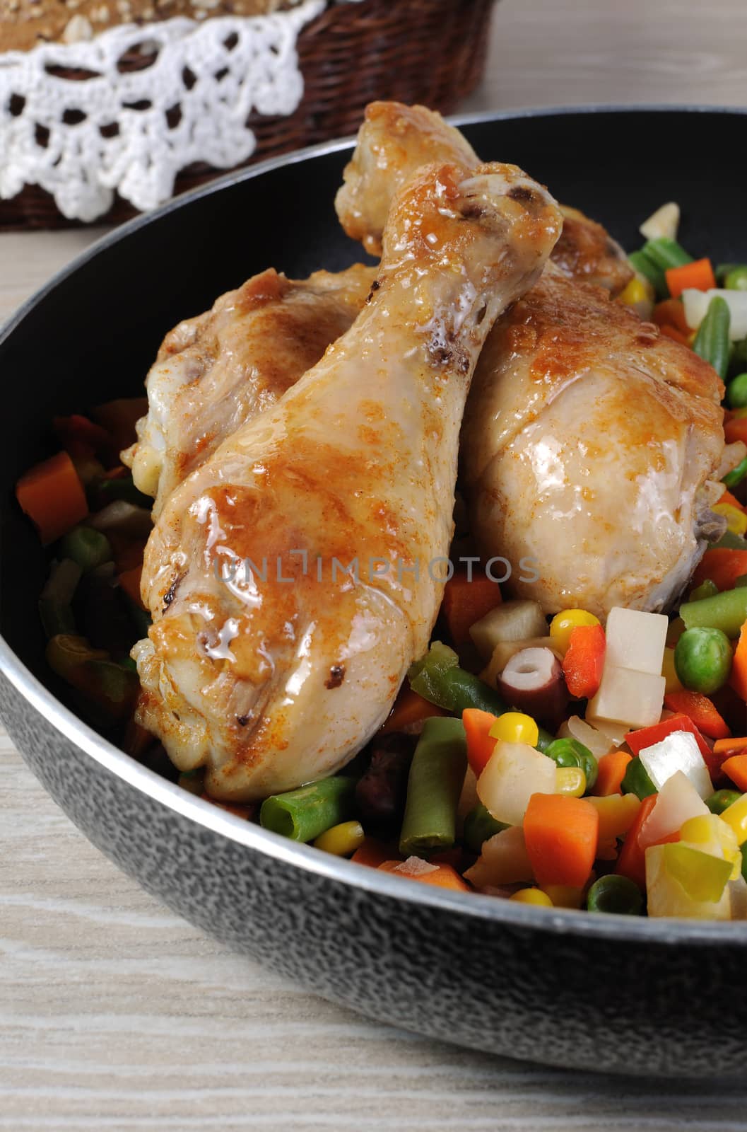Roasted chicken drumstick with vegetables by Apolonia