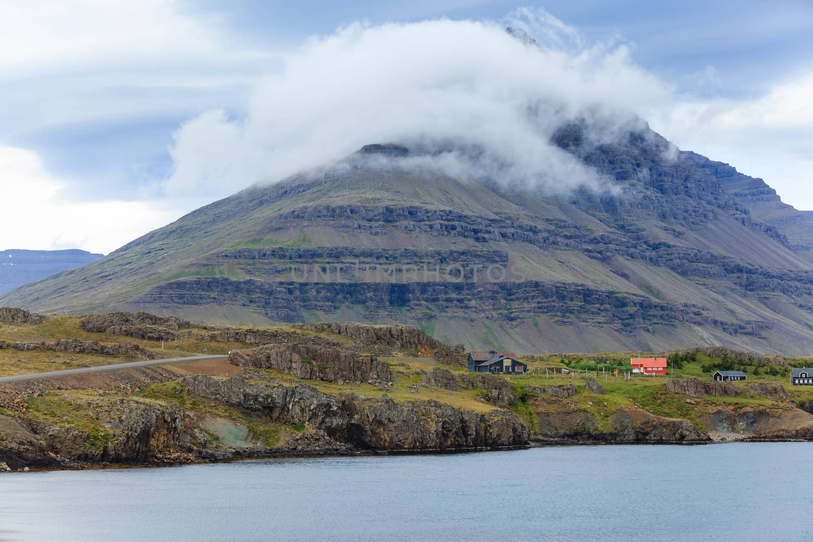 Cloudy sky over the coast in the East Fjords Iceland.
