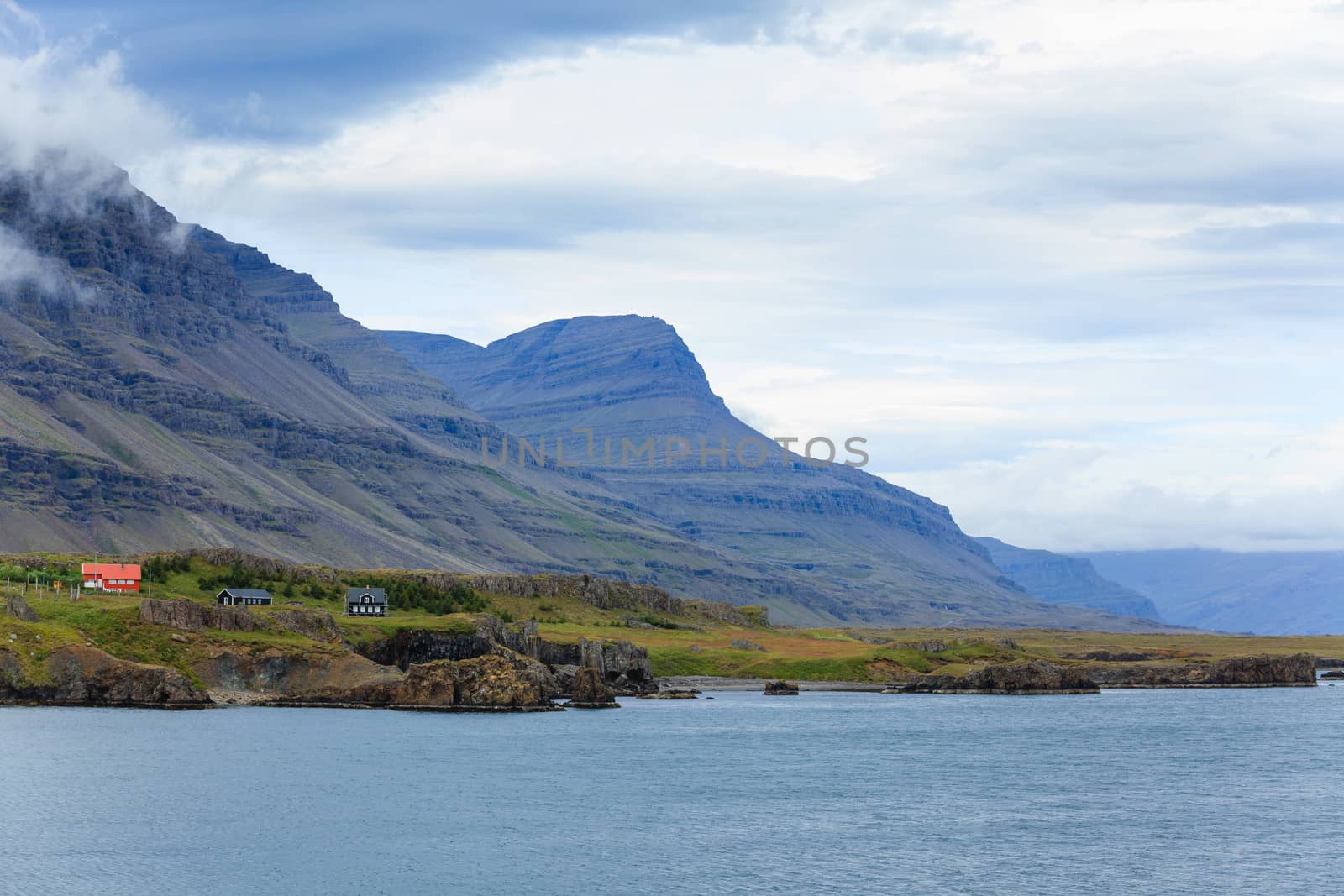 Cloudy sky over the coast in the East Fjords Iceland.