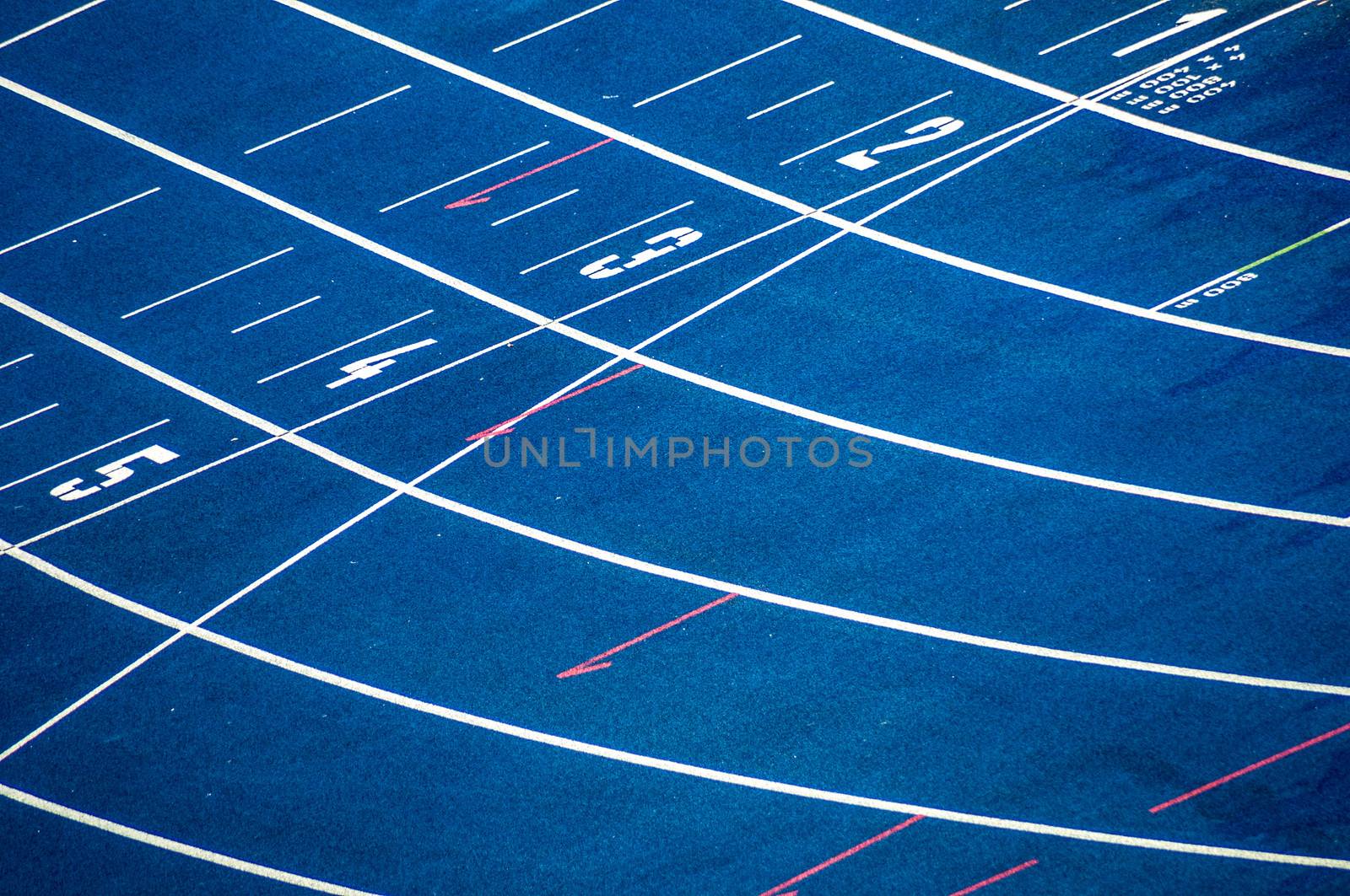 background of the start line of blue running tracks