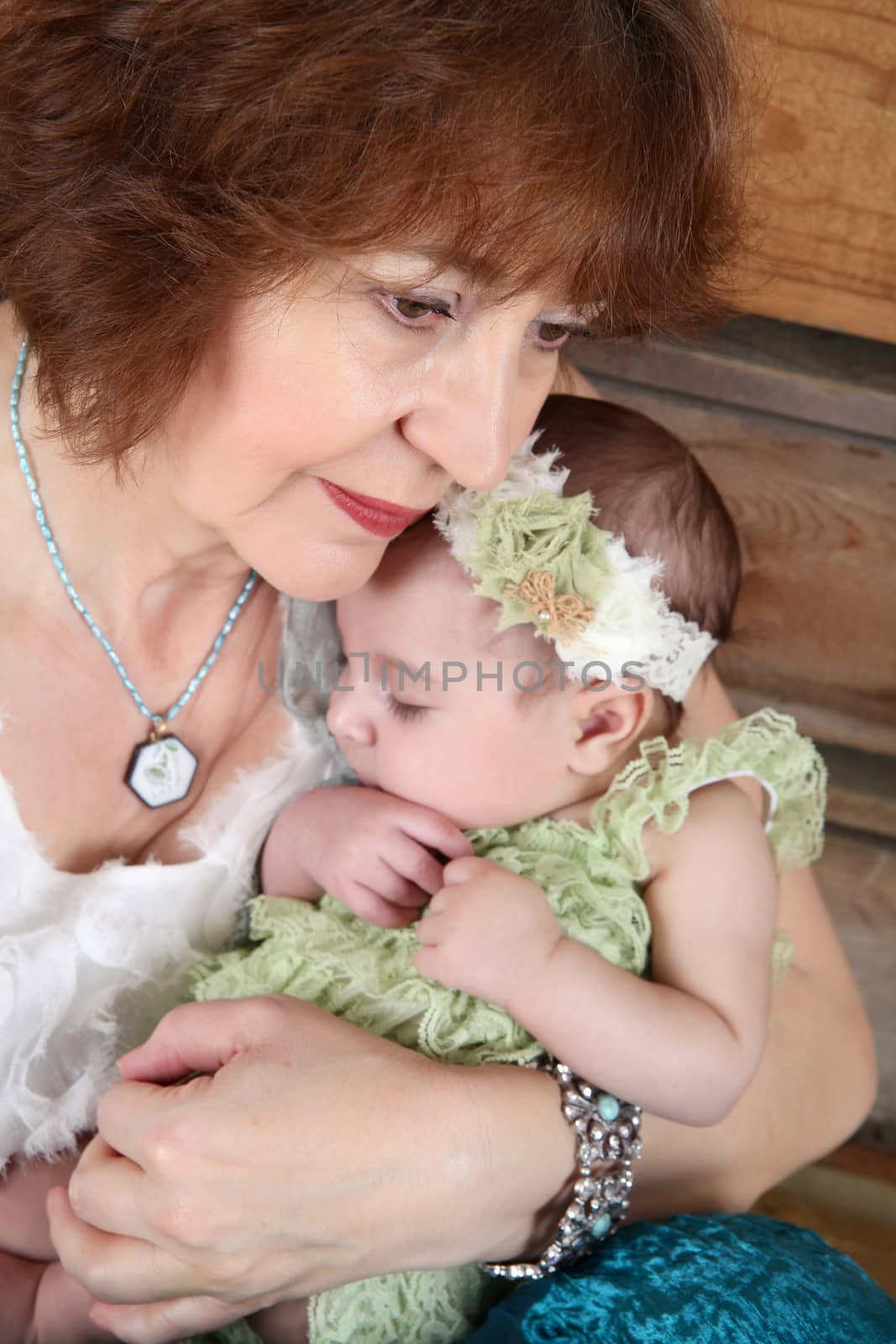 Grandmother with a three month old baby girl